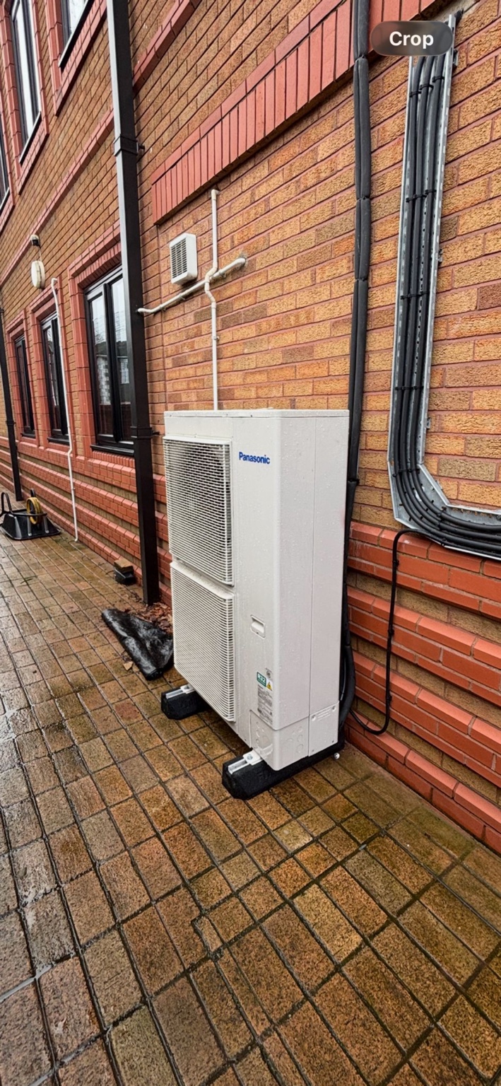 Commercial outdoor air conditioning unit installed by DW Heating & Cooling Services